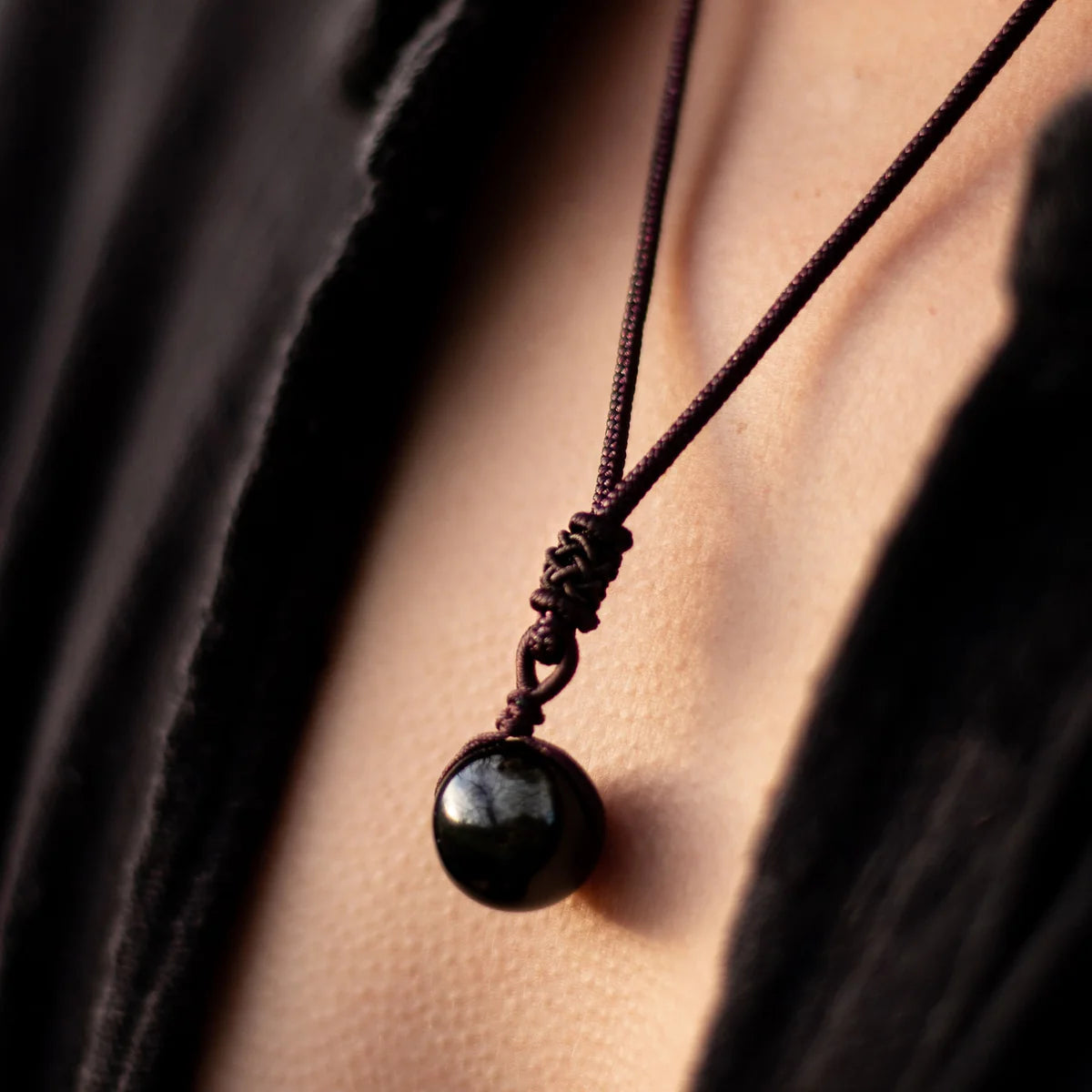 Golden obsidian “sphere” pendant