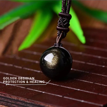 Golden obsidian “sphere” pendant